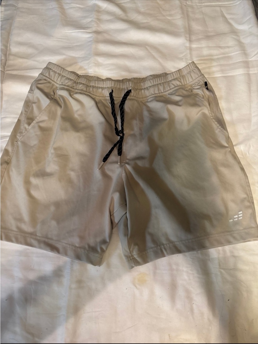 Fabletics Men's Athletic Shorts in Light Tan with Black Drawstring